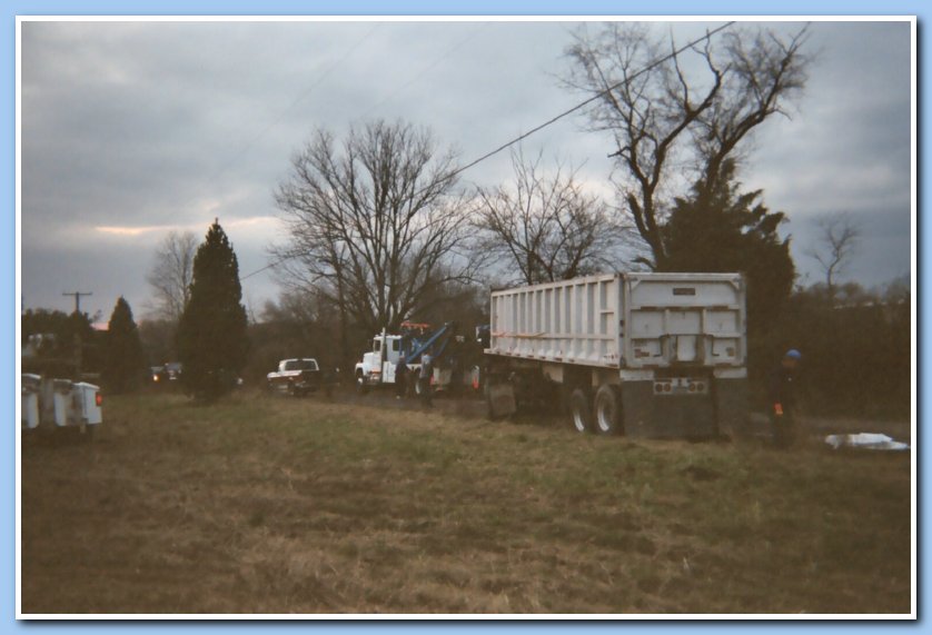 Unit 8 hooked up to the rolled over truck